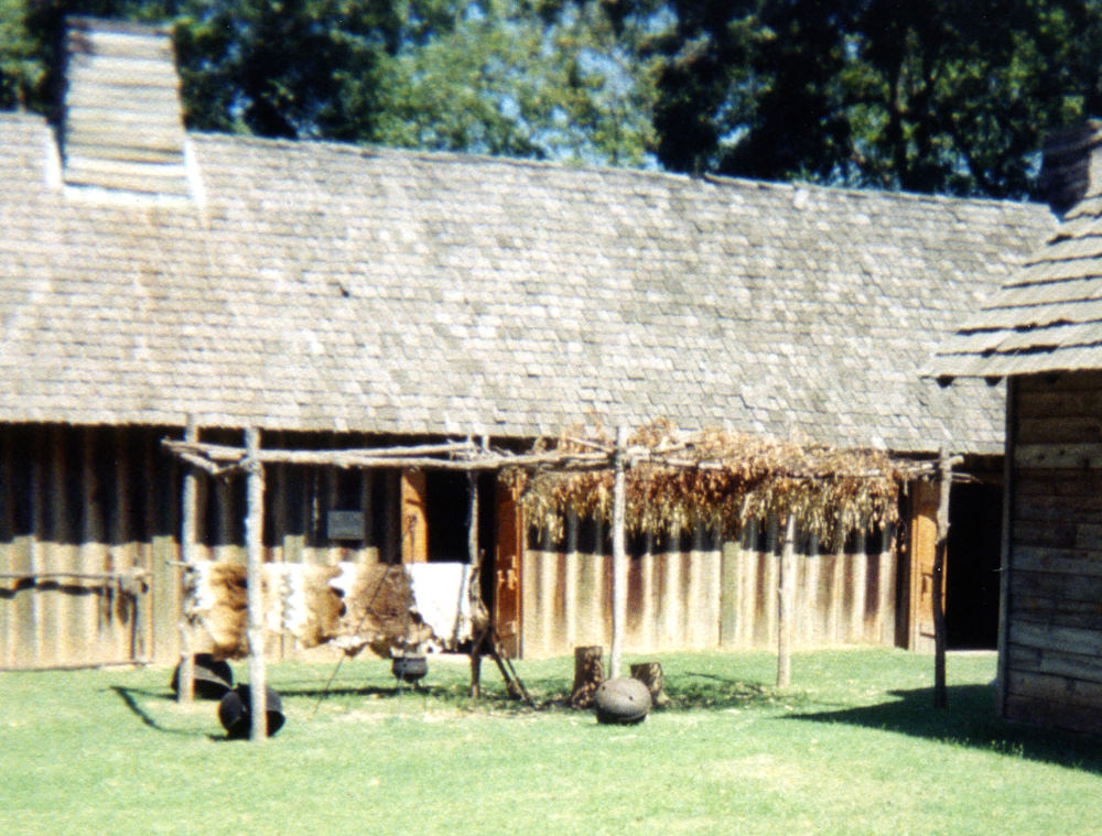 photo of an interpretive scene at Fort St. Jean Baptiste, depicting goods involved in the robust French-Caddo trade