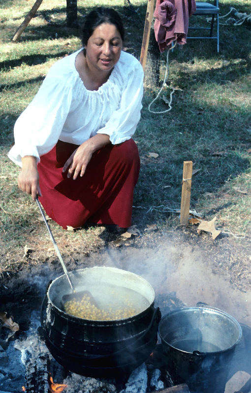 photo of historical interpreter Rhonda Gauthier is preparing hominy as part of a public program at Los Adaes 