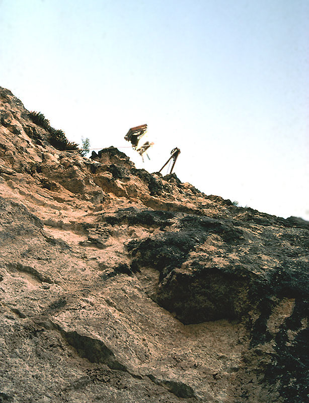 Equipment being lowered by winch truck, 1983. Photograph by Solveig Turpin.