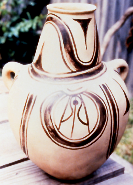 A copy of the water jar, with a reconstruction of the painted black design.
