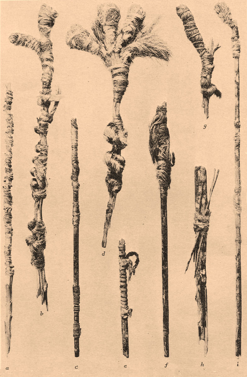Closeup of dart or stalk pajo, or prayer stick, reported by C.B. Cosgrove from Ceremonial Cave, circa 1928 (click for full image). The atlatl darts are shown with attached fiber bolls which were filled with tobacco. The pajos were made of sotol bloom stalks. Specimen "b" is roughly 20 inches long; the originals would have been much longer. Image from Cosgrove 1947.