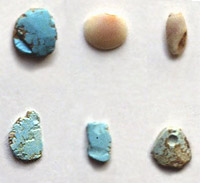 Turquoise pendants, marine shell beads, pottery, and many other items were traded widely among the Jornada Mogollon and groups in distant regions. These items are from Firecracker pueblo.