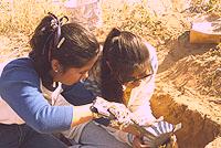Students collecting flotation samples from the fill of one of the pithouses. The analysis of many such samples from Firecracker Pueblo provided a great deal of very useful information about what people were eating and how they used the landscape.
