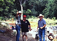 Landowners Ricky and Howard Lindsey give their approval of the TAS field school to TAS President Skip Kenedy (in the middle).
