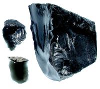 Obsidian core and flakes from a volcanic source in central Mexico.