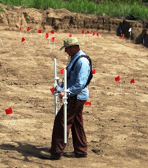 photo of Chet Walker conducting geophysical survey