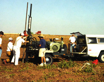 Vance Holliday and crew set up a coring rig to take sediment samples of this locale outside Lubbock. Such samples can reveal the layering of the deposits without digging a huge hole. Photo by E. Mott Davis.
