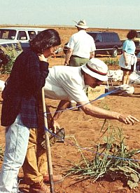 Geoarcheologist Vance Holliday points out new evidence to TAS Field School Director Eileen Johnson. Photo by E. Mott Davis.