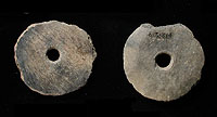 Pottery disks, possibly used as spindle whorls.