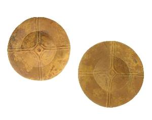 photo of set of ear spools found in a burial at the Pine Tree Mound site