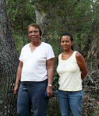 photo of Jewel Andrews (left), one of Ransom and Sarah Williams’ great granddaughters, visiting the Williams farmstead with Dr. Maria Franklin.