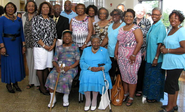 Photo of members of the descendant community, shown at the George Washington Carver Museum and Cultural Center in Austin