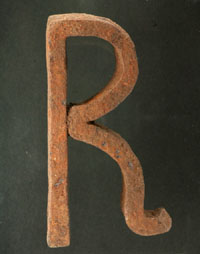 photo of letter a remant of Ransom Williams branding iron