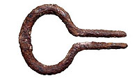 photo of the rusted metal frame of a jaw harp found at the Williams' farm