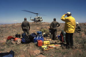 Photo of Border Patrol helicopter departing after dropping off the archeological crew